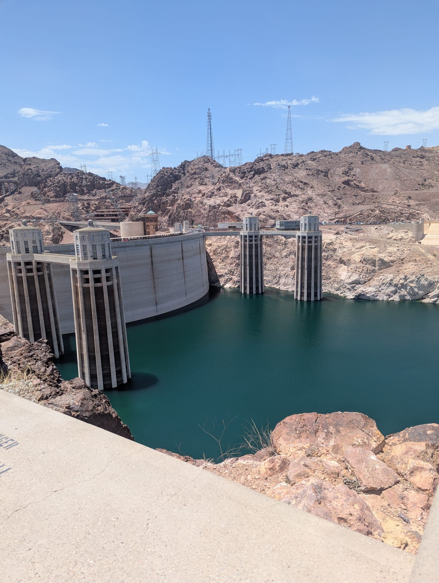 Hoover Dam intake towers on the Nevada side — the four towers control water flow from Lake Mead into the penstocks that feed the turbines below